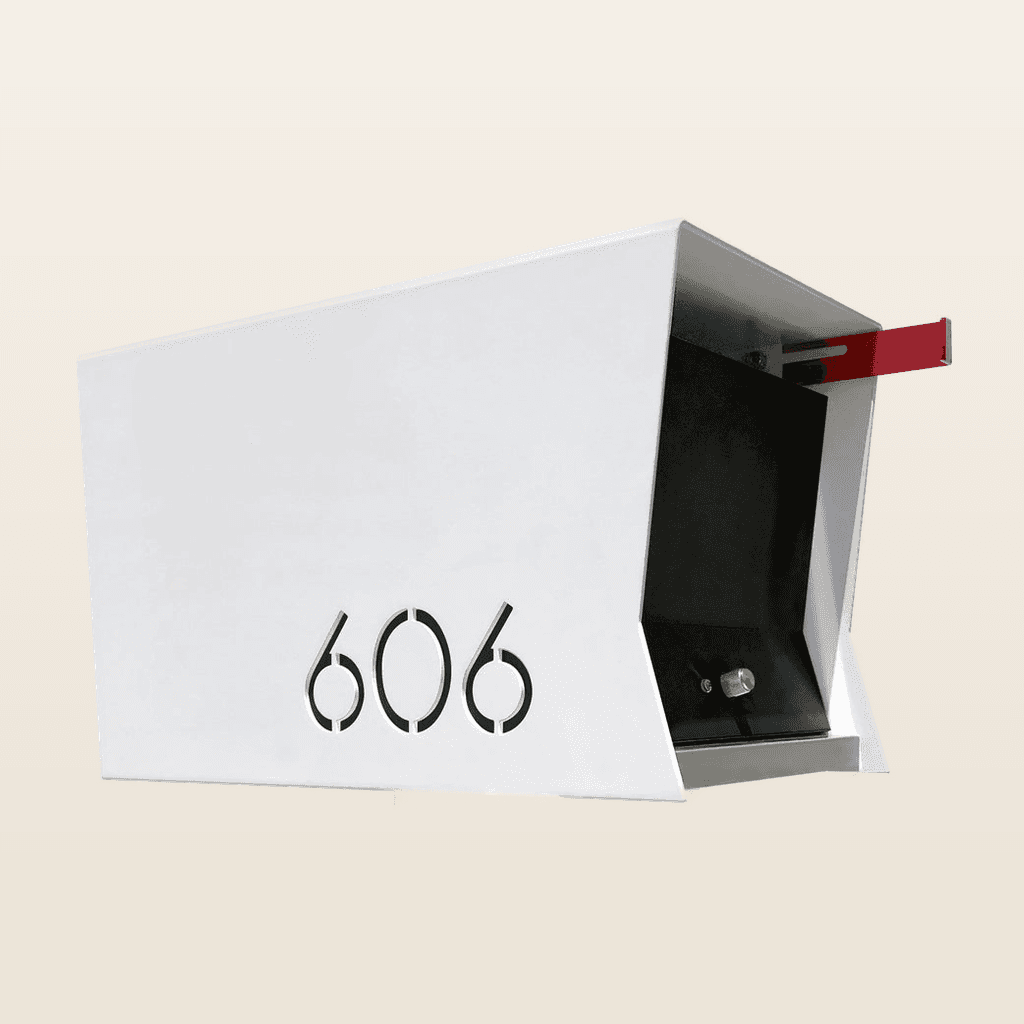 Real mailbox example — white concrete pillar with illuminated house numbers